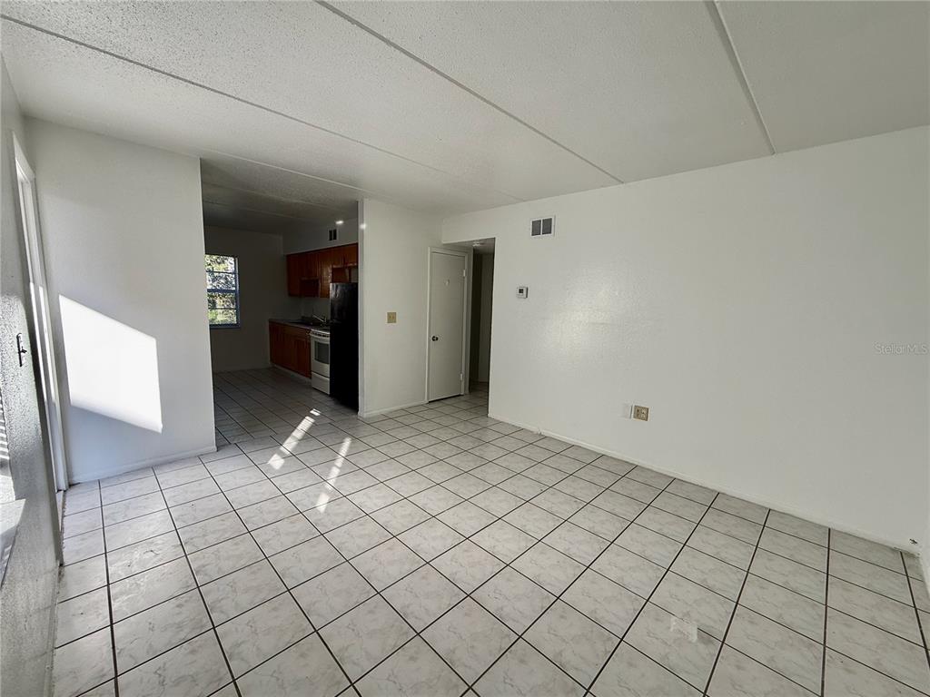 716 Michigan Court, Unit 2 St. Cloud, FL 34769 - Photo 7 of 17 a view of an empty room