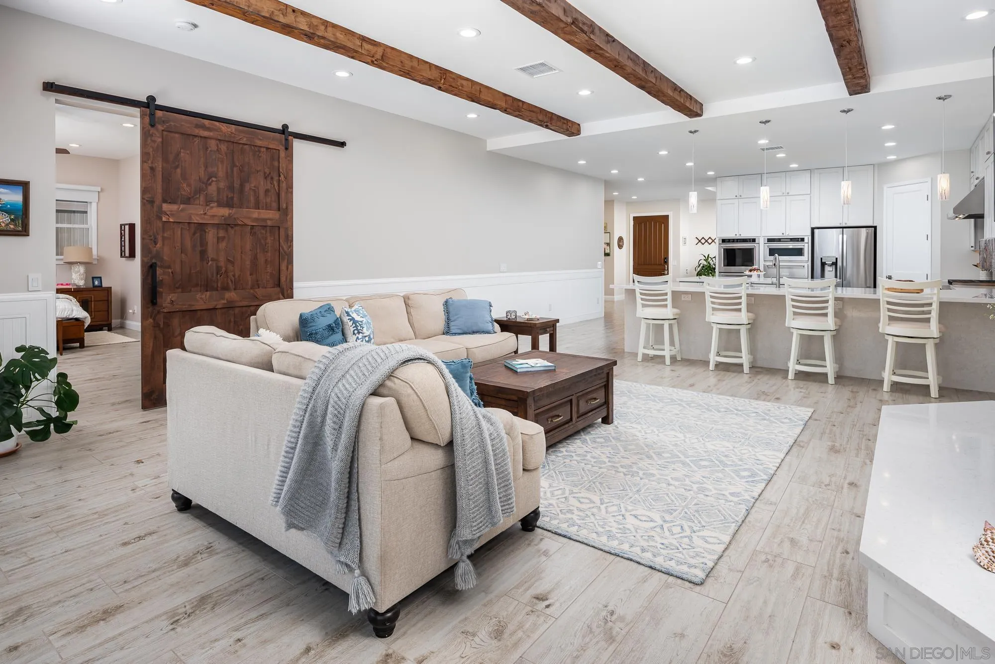 1060 Pine Street Coronado, CA 92118 - Photo 13 of 36 a living room with furniture and a table