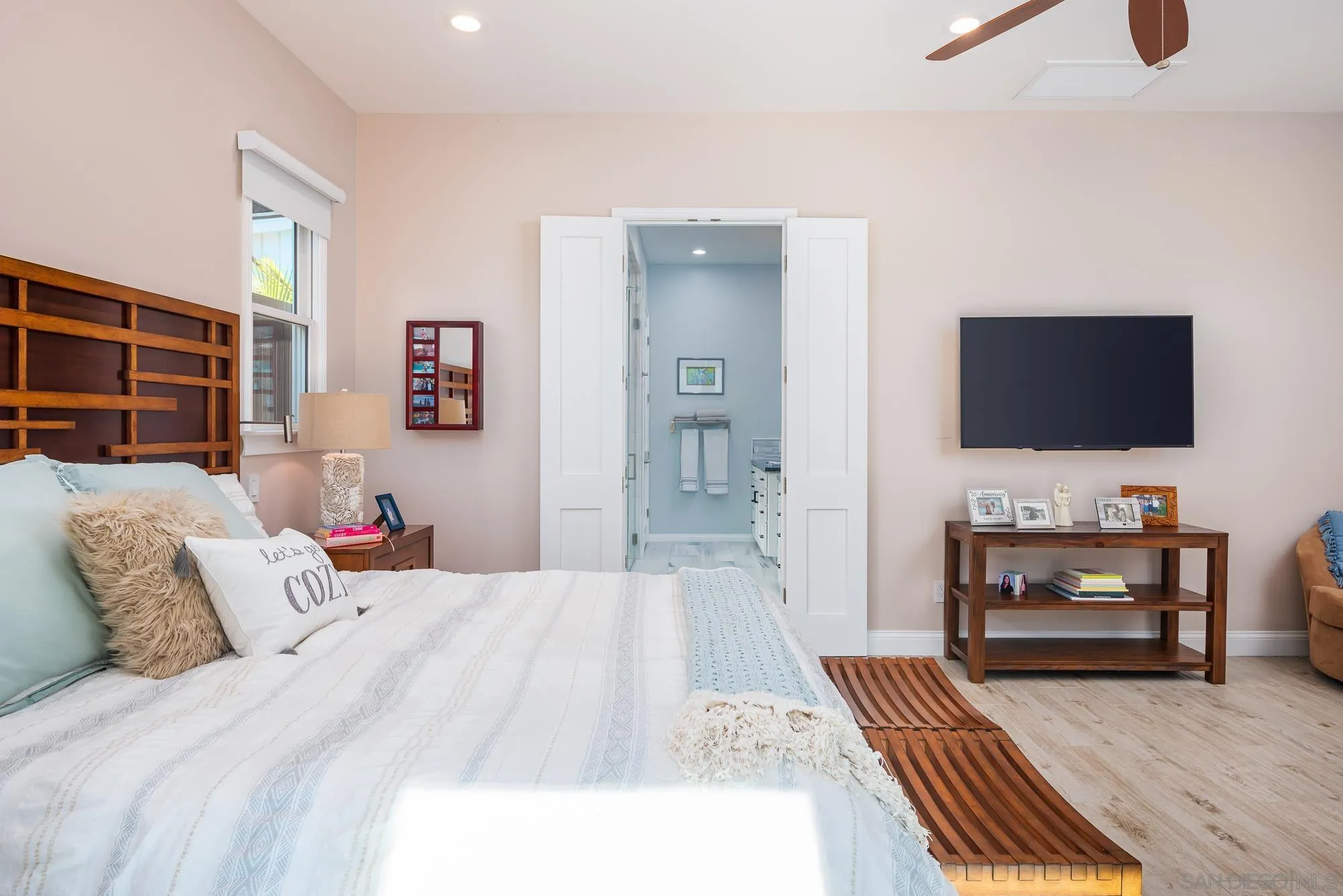 1060 Pine Street Coronado, CA 92118 - Photo 20 of 36 a bedroom with furniture and a flat screen tv