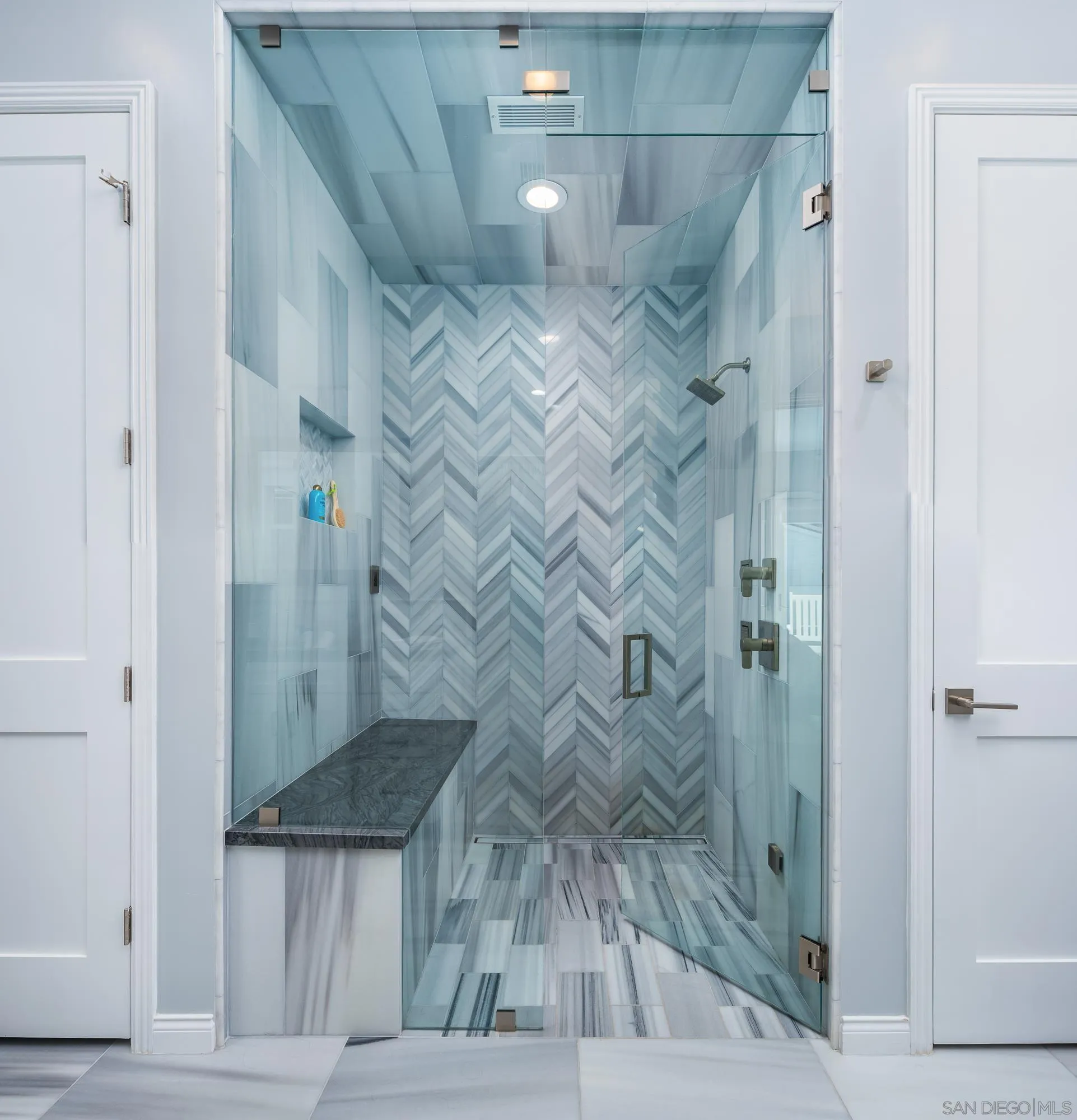 1060 Pine Street Coronado, CA 92118 - Photo 22 of 36 a bathroom with a shower and a sink