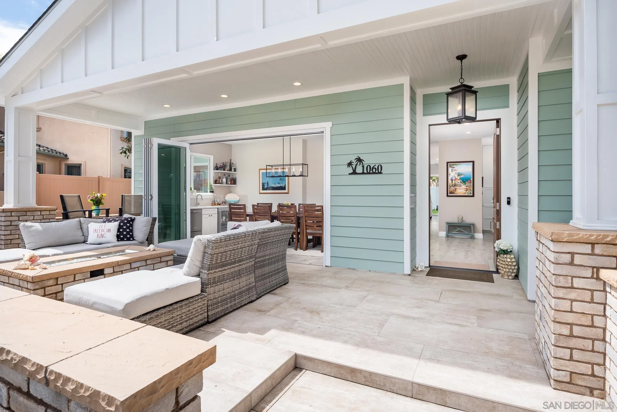 1060 Pine Street Coronado, CA 92118 - Photo 3 of 36 a living room with furniture and a chandelier