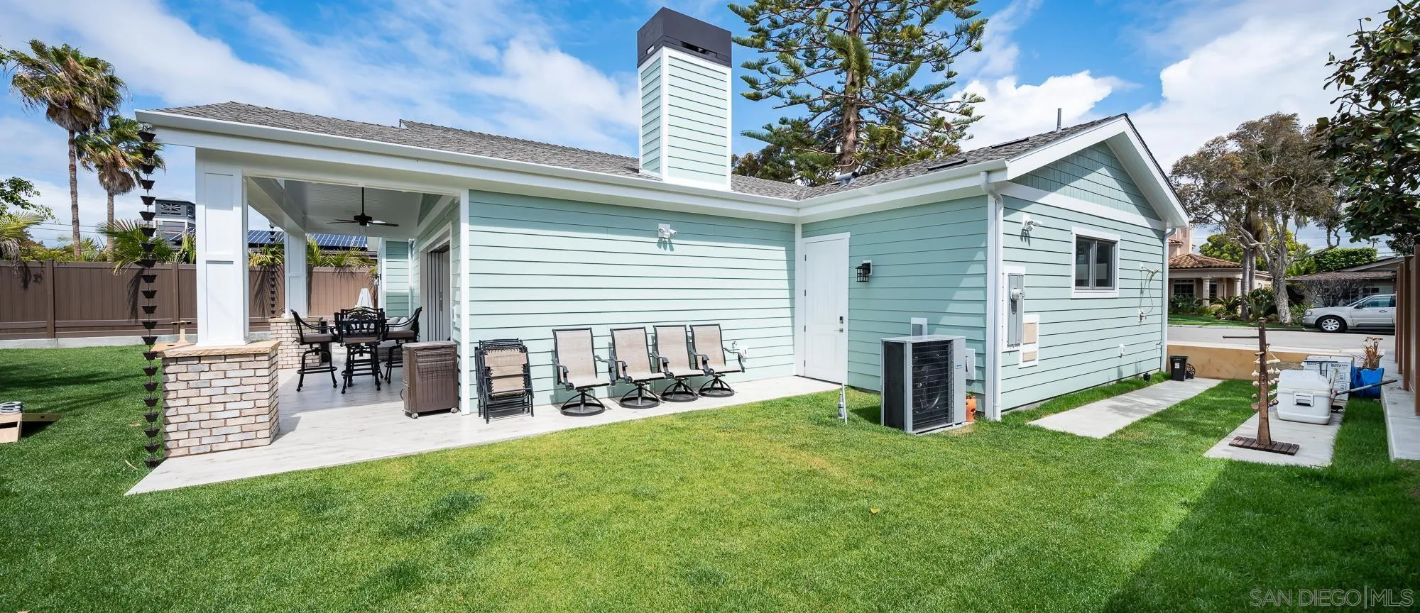 1060 Pine Street Coronado, CA 92118 - Photo 33 of 36 a view of a house with a yard and a garden
