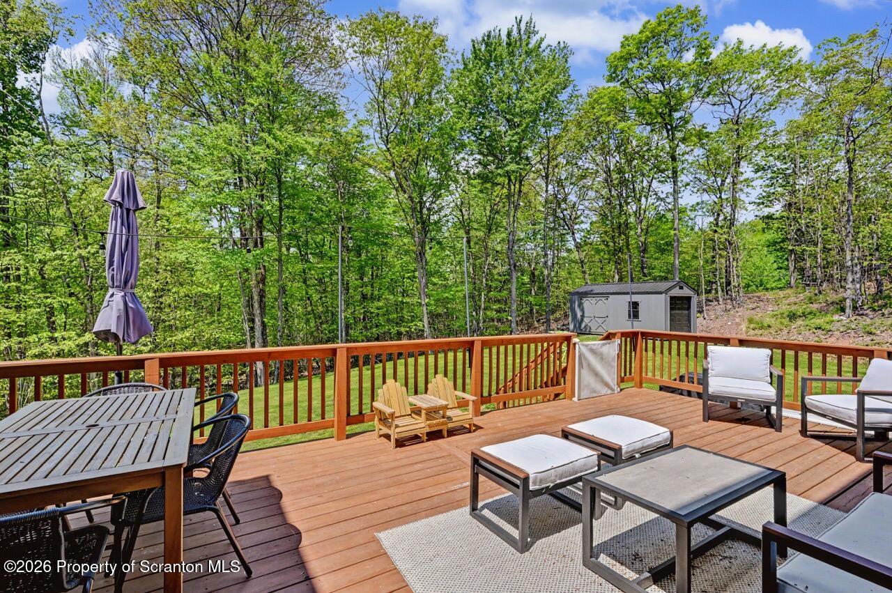 100 Highland Road Moscow, PA 18444 - Photo 76 of 85 a view of a chairs and table on the deck