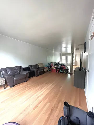 a kitchen with a sink cabinets and appliances