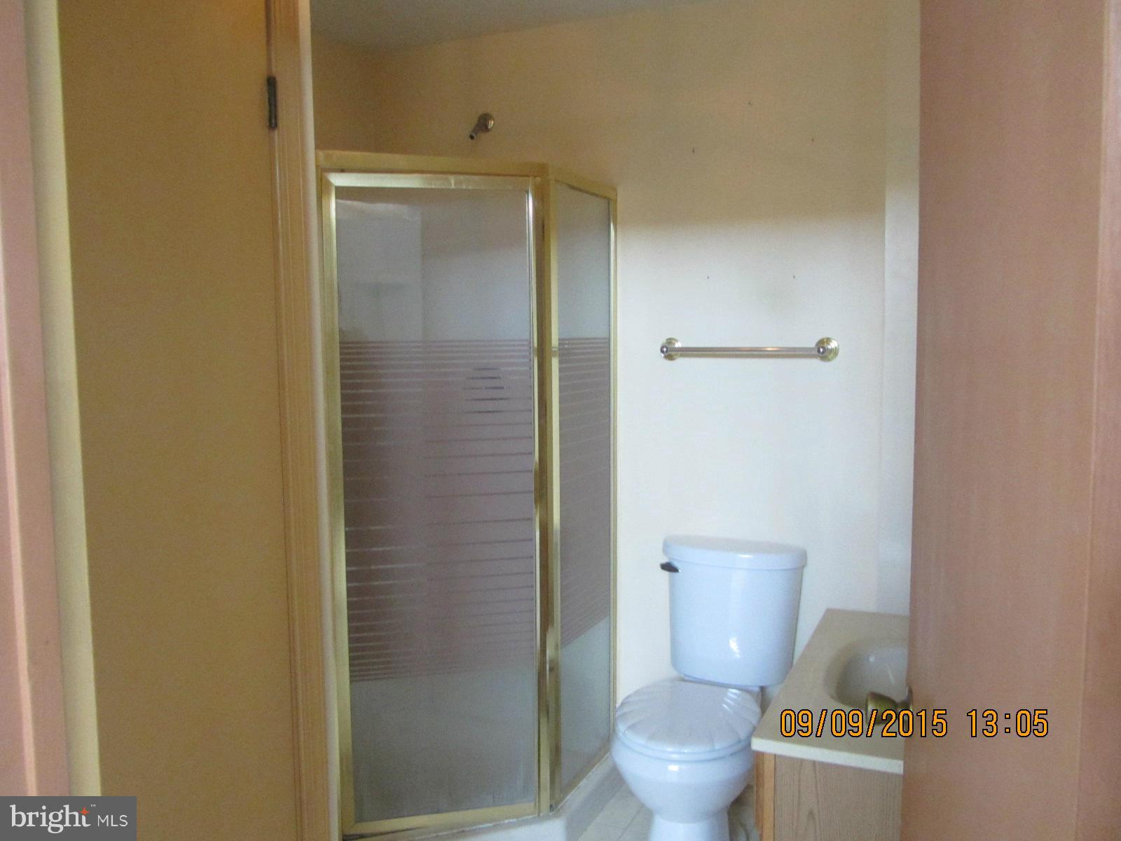 38451 Bayview Road Coltons Point, MD 20626 - Photo 15 of 30 a bathroom with a toilet and a shower