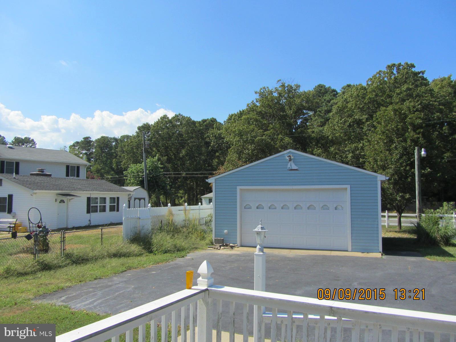 38451 Bayview Road Coltons Point, MD 20626 - Photo 22 of 30 an outdoor view of house with yard