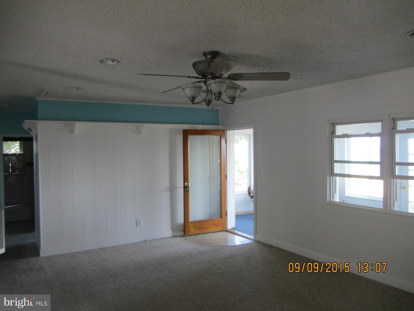 38451 Bayview Road Coltons Point, MD 20626 - Photo 6 of 30 a view of a chandelier fan and a chandelier fan in a room