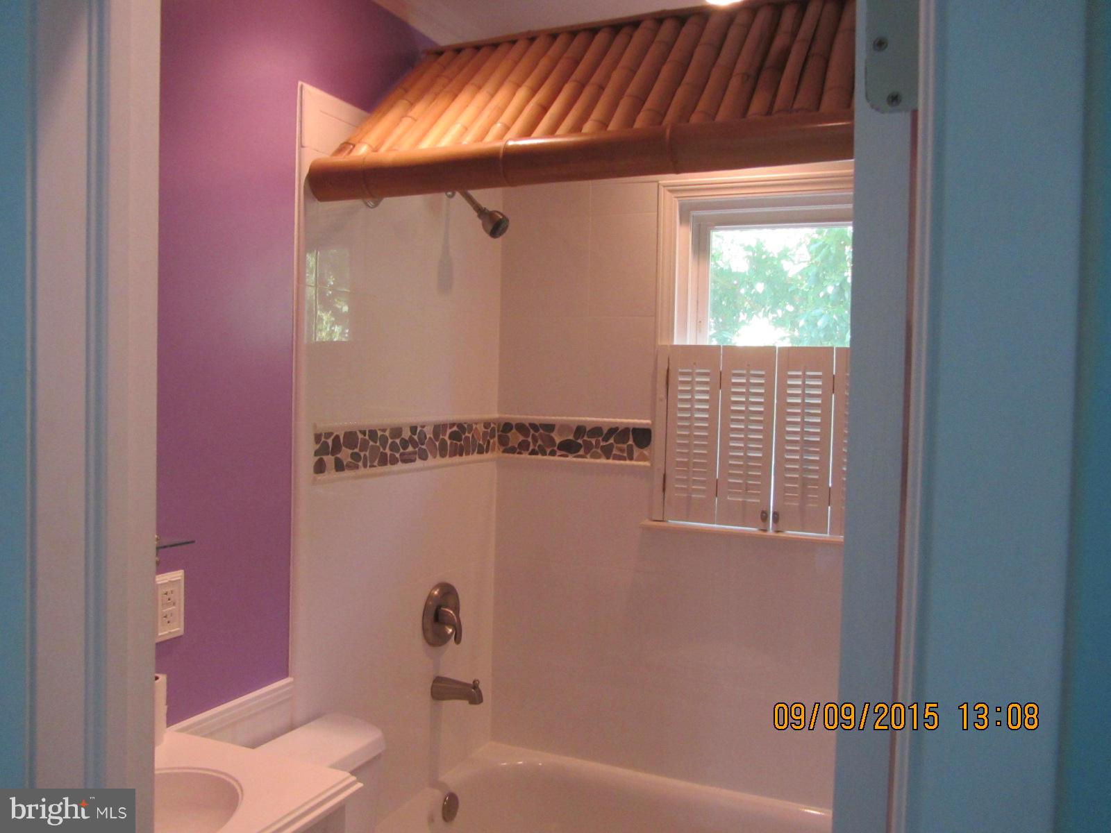 38451 Bayview Road Coltons Point, MD 20626 - Photo 8 of 30 a bath room with a toilet and a bath tub