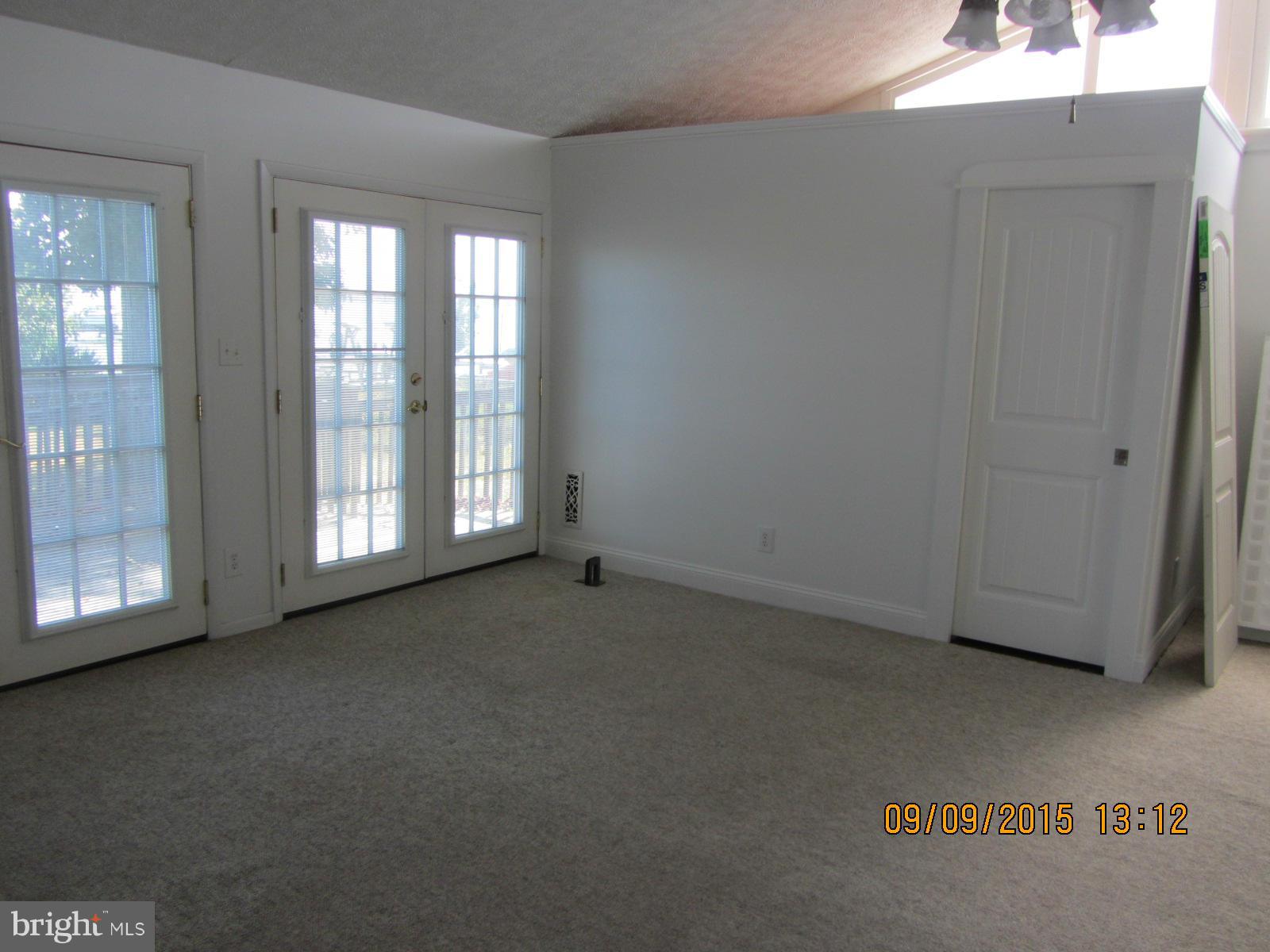 38451 Bayview Road Coltons Point, MD 20626 - Photo 10 of 30 an empty room with windows