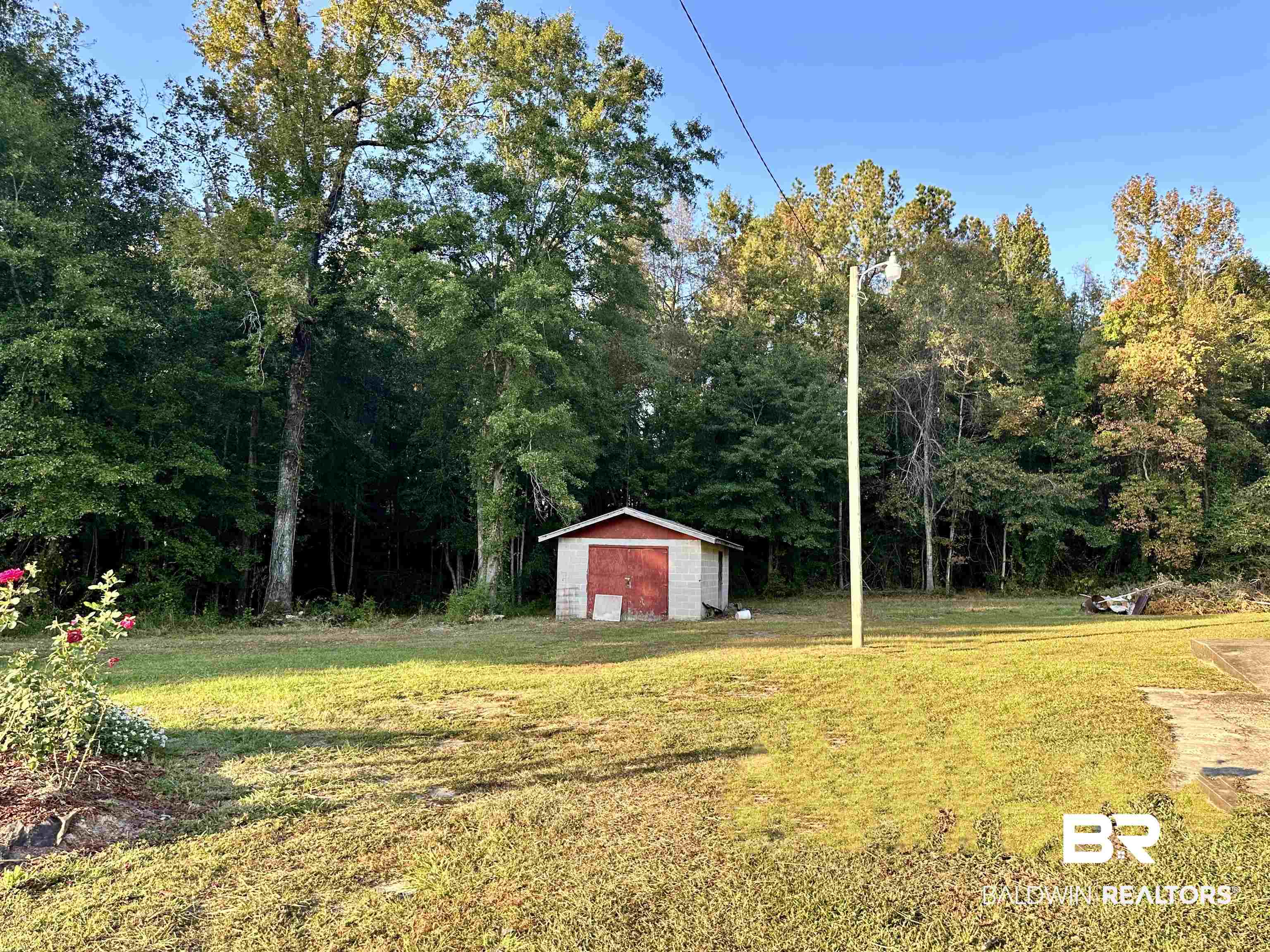 1206 St Nicholas Avenue Brewton, AL 36426 - Photo 18 of 19 View of yard with a storage shed