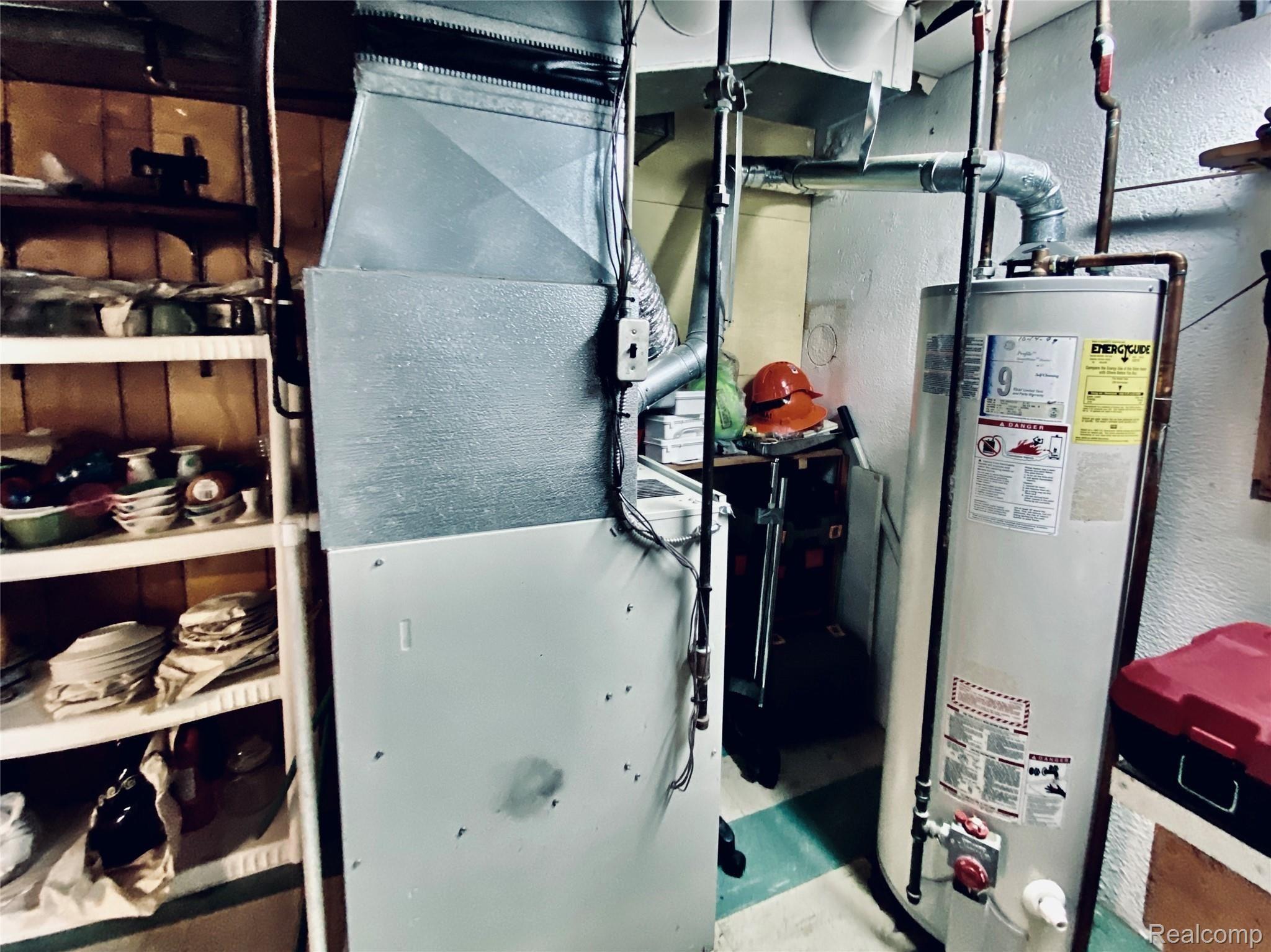 18484 Davidson Road Fraser, MI 48026 - Photo 37 of 45 Furnace and HW Tank.JPG