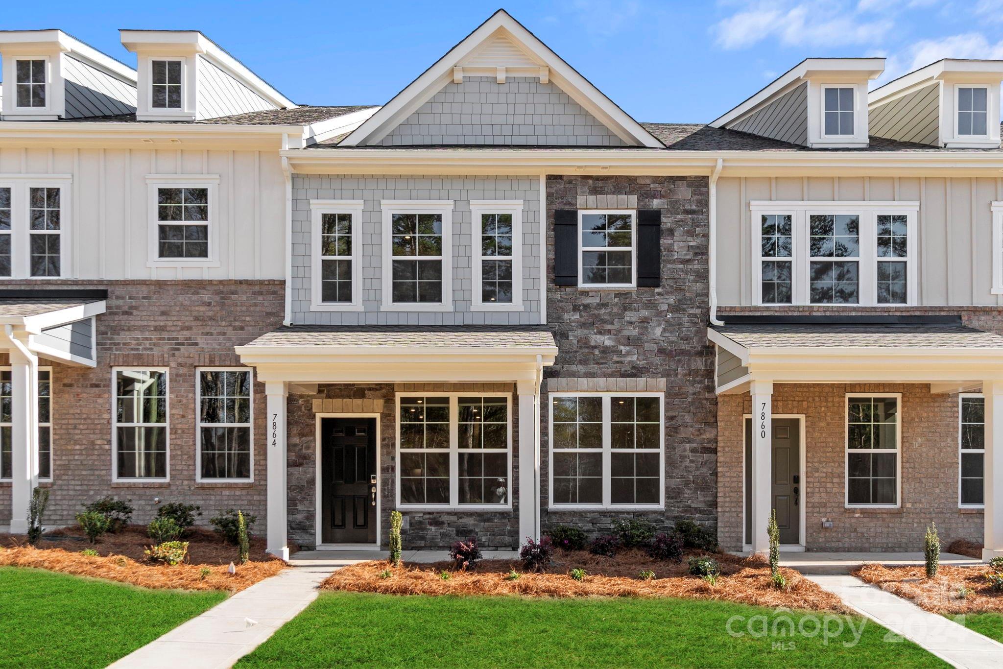7864 Nelson Road Mint Hill, NC 28227 - Photo 1 of 45 front view of a brick house with a yard