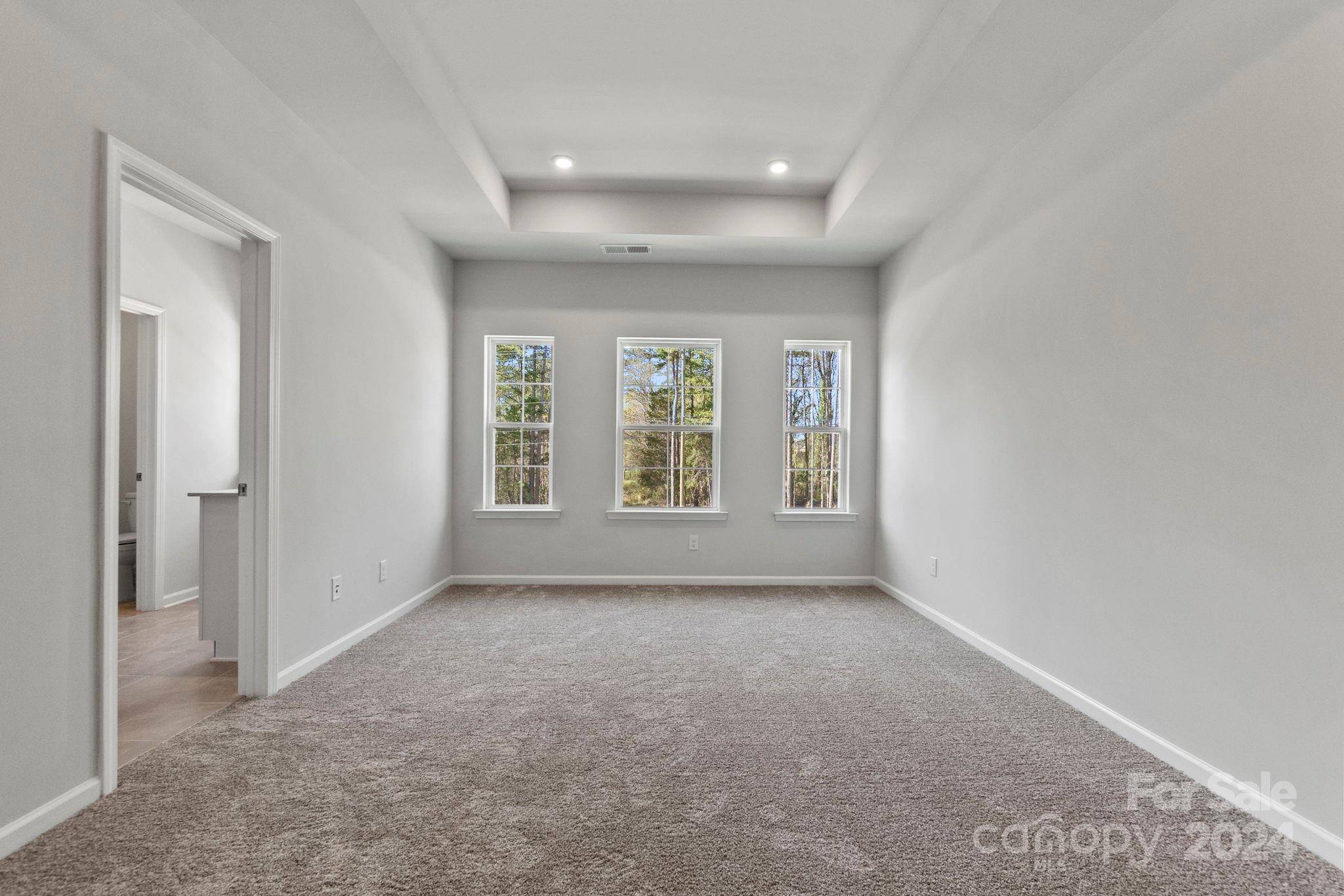 7864 Nelson Road Mint Hill, NC 28227 - Photo 30 of 45 an empty room with windows