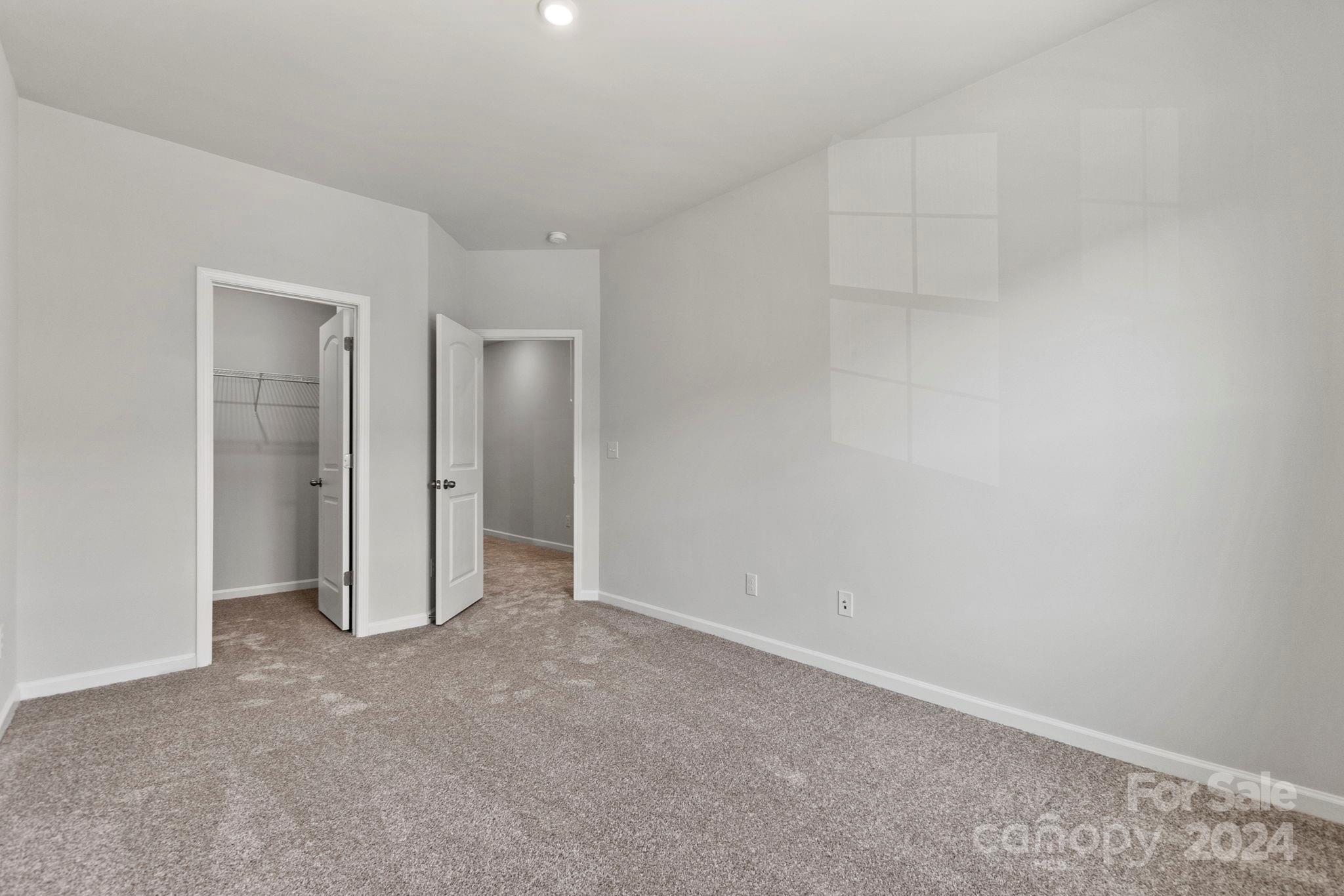 7864 Nelson Road Mint Hill, NC 28227 - Photo 36 of 45 a view of an empty room and closet area