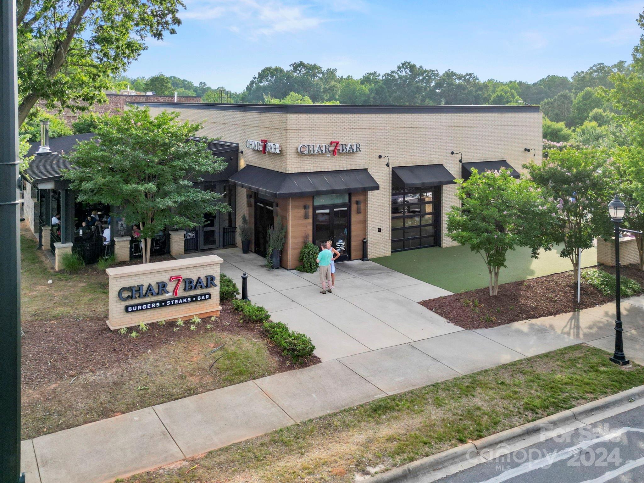 7864 Nelson Road Mint Hill, NC 28227 - Photo 44 of 45 a view of house with outdoor space and sitting area