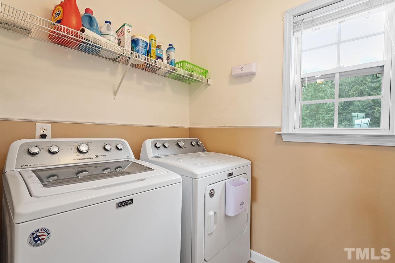 206 Kendall Drive Clayton, NC 27520 - Photo 24 of 34 a utility room with dryer and washer