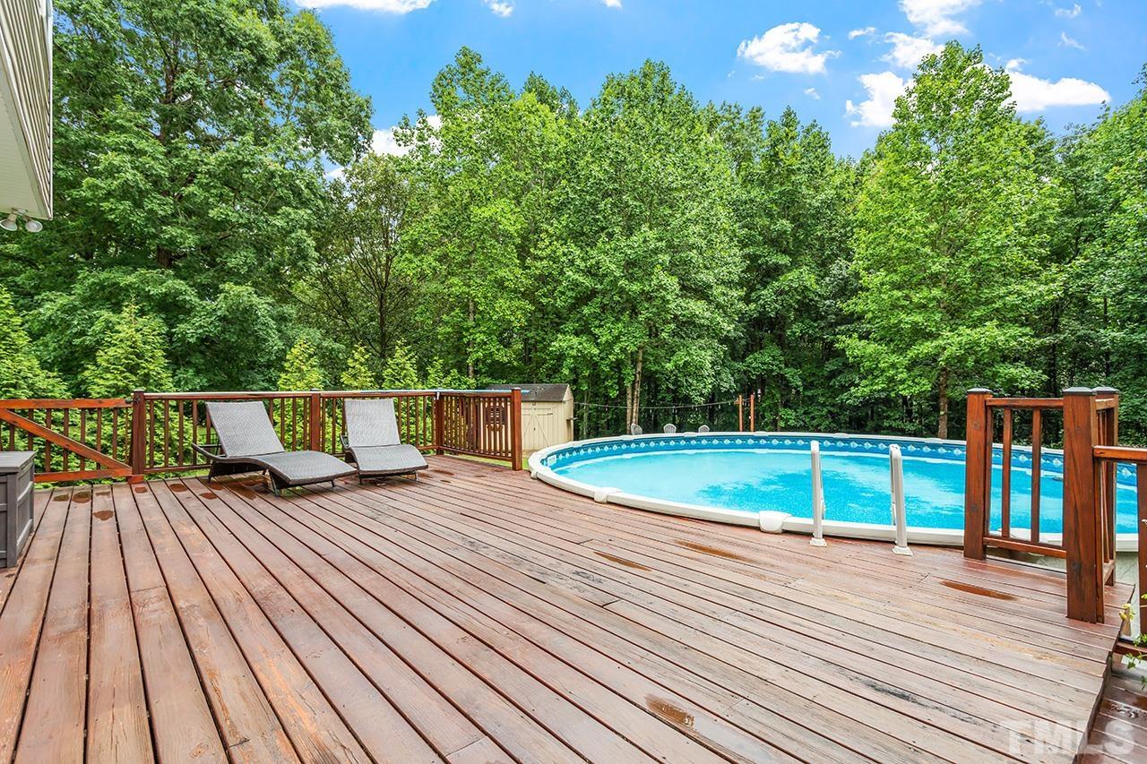 206 Kendall Drive Clayton, NC 27520 - Photo 3 of 34 a view of a roof deck
