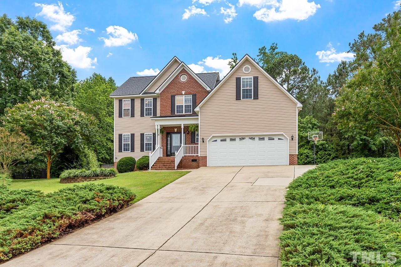 206 Kendall Drive Clayton, NC 27520 - Photo 34 of 34 a front view of a house with yard