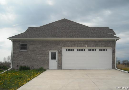 13687 Stowell Road Dundee, MI 48131 - Photo 24 of 25 13867 Stowell garage spring