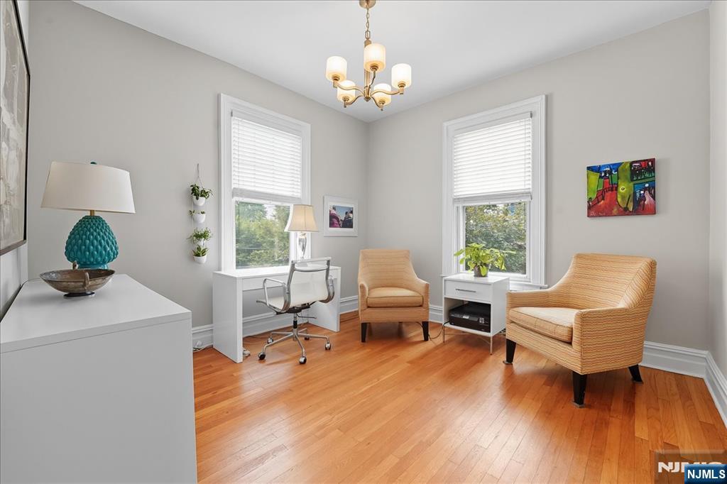 56-58 Bonn Place Weehawken, NJ 07086 - Photo 15 of 29 a living room with furniture and a window