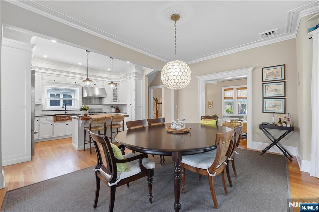 56-58 Bonn Place Weehawken, NJ 07086 - Photo 3 of 29 a view of a dining room and livingroom view