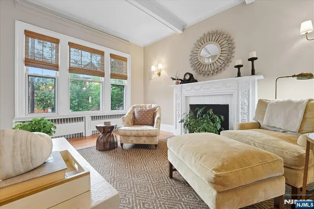 a bedroom with a large bed and a couch