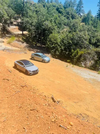 a view of an ocean and a mountain