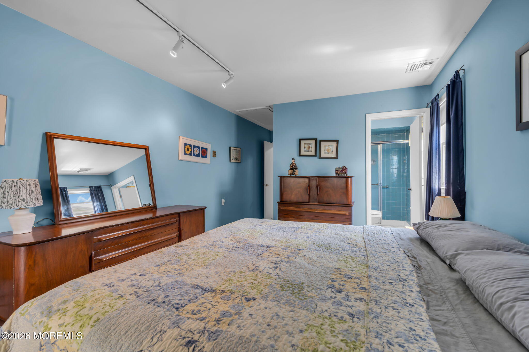 67 Blake Circle Brick, NJ 08724 - Photo 24 of 34 a bedroom with a bed and a dresser in it