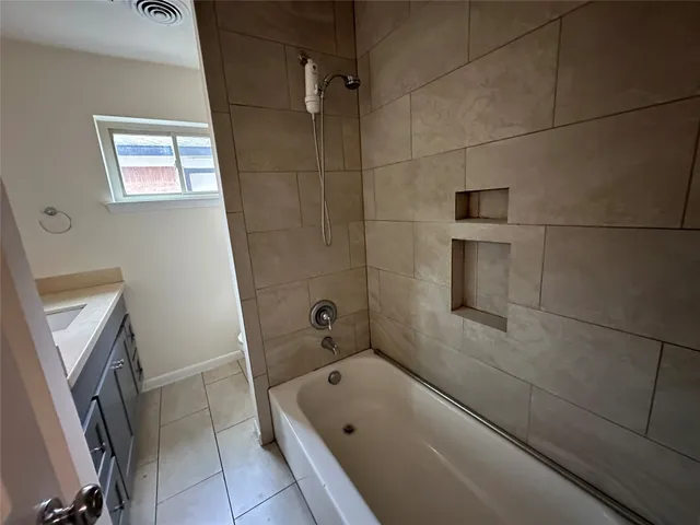 a bathroom with a sink and toilet