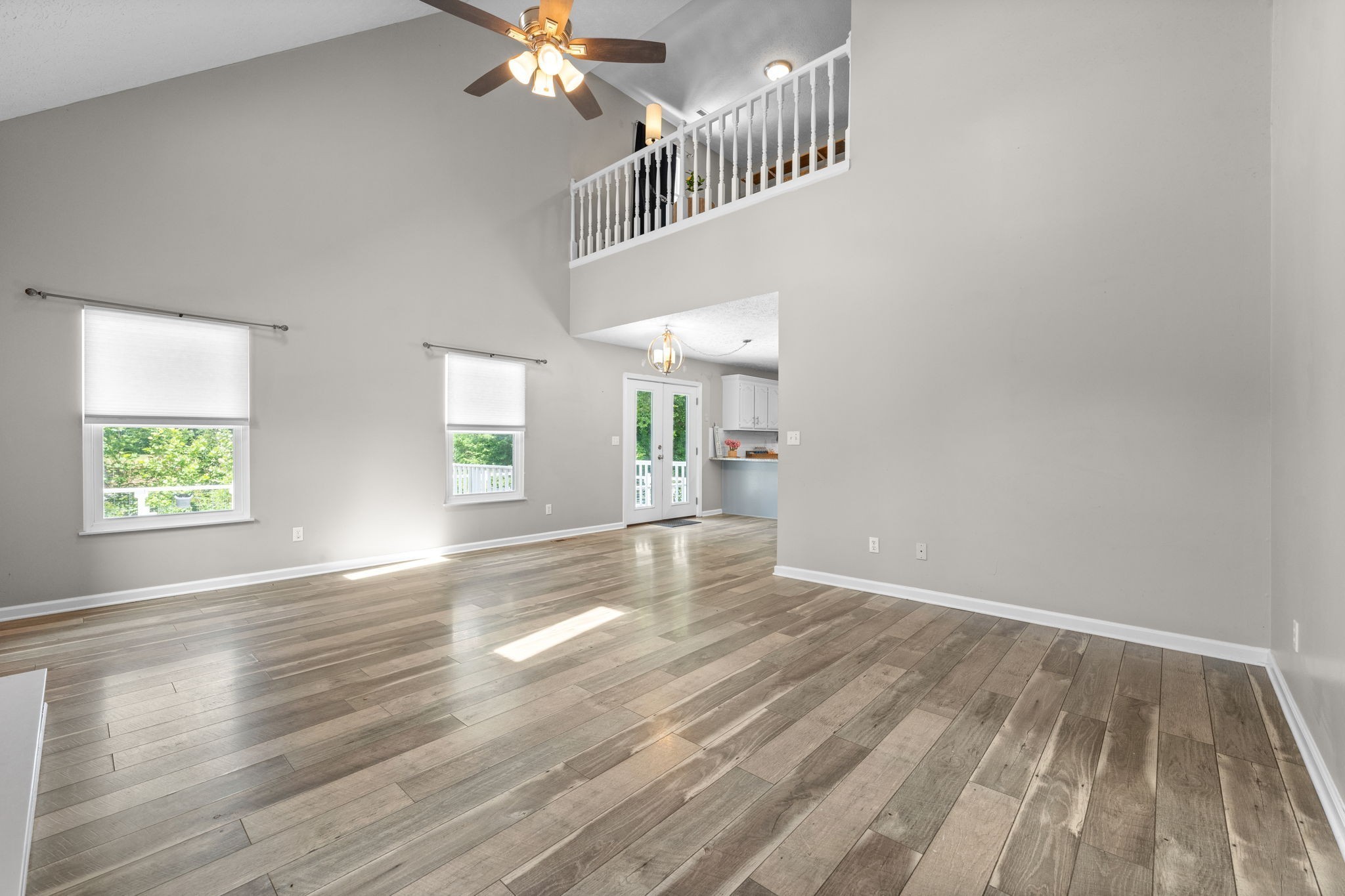 4178 Highway 49 Tennessee Ridge, TN 37178 - Photo 12 of 38 wooden floor in an empty room with a window