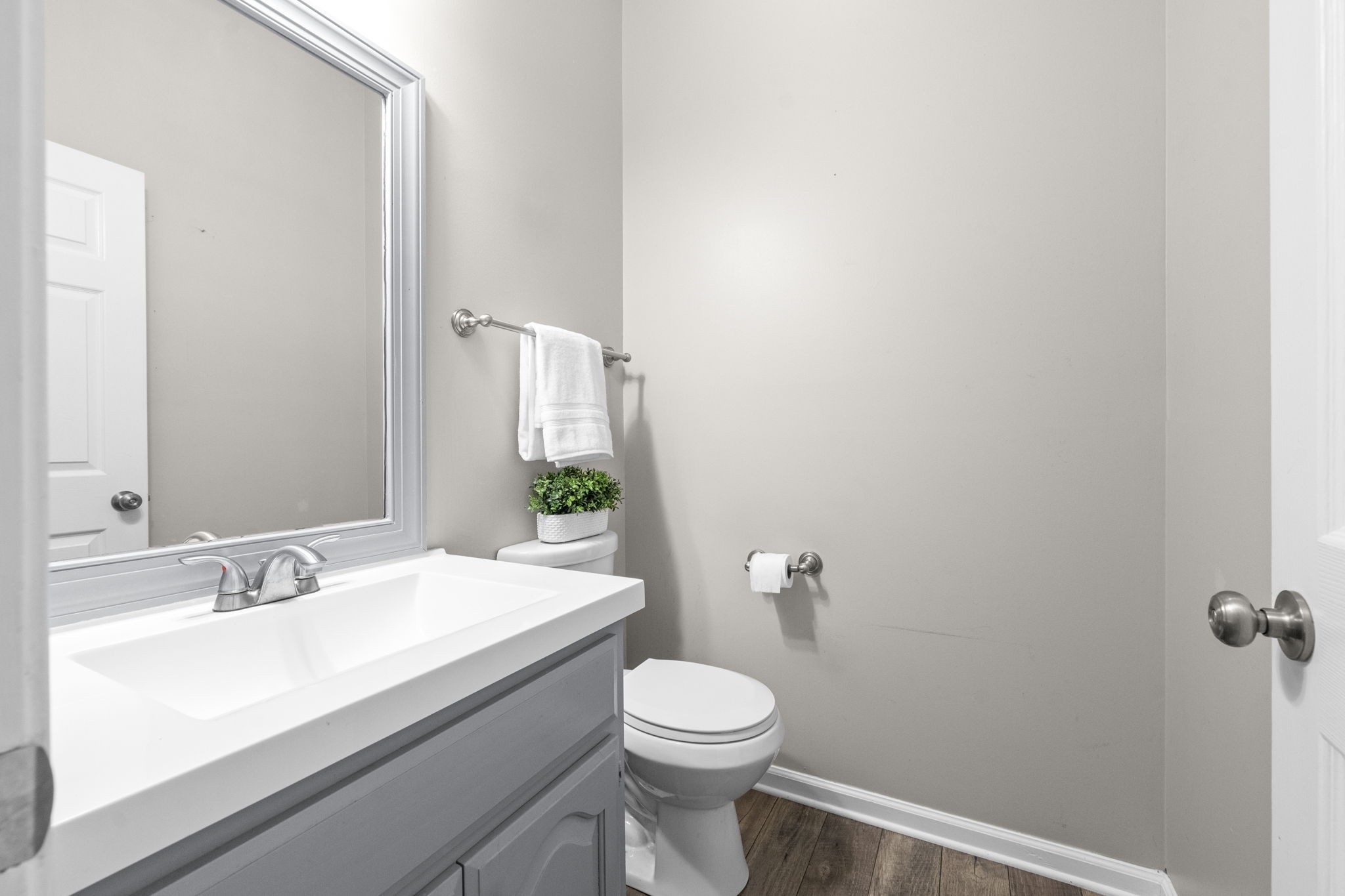 4178 Highway 49 Tennessee Ridge, TN 37178 - Photo 21 of 38 a bathroom with a sink a toilet and mirror