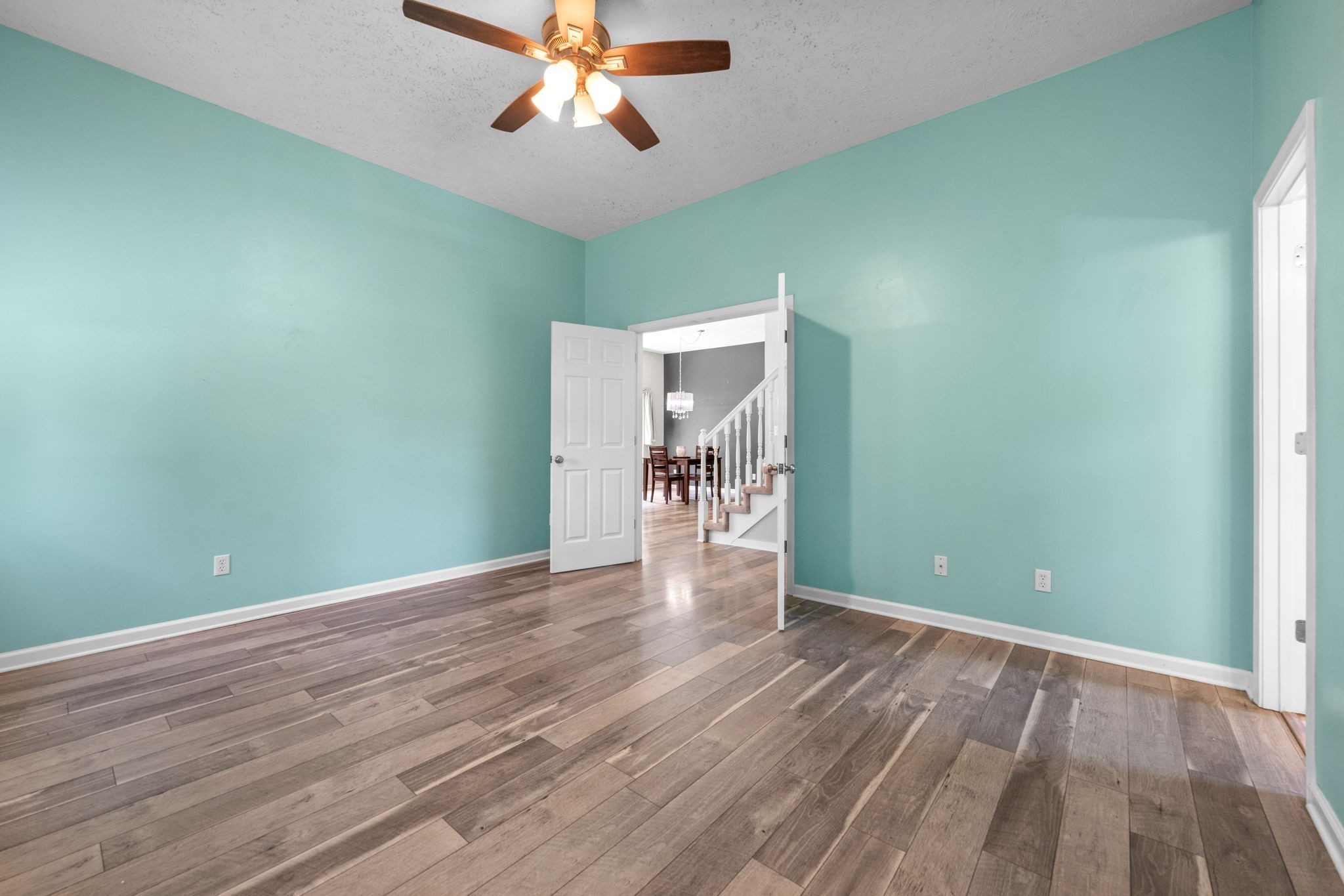 4178 Highway 49 Tennessee Ridge, TN 37178 - Photo 23 of 38 wooden floor in an empty room with a window