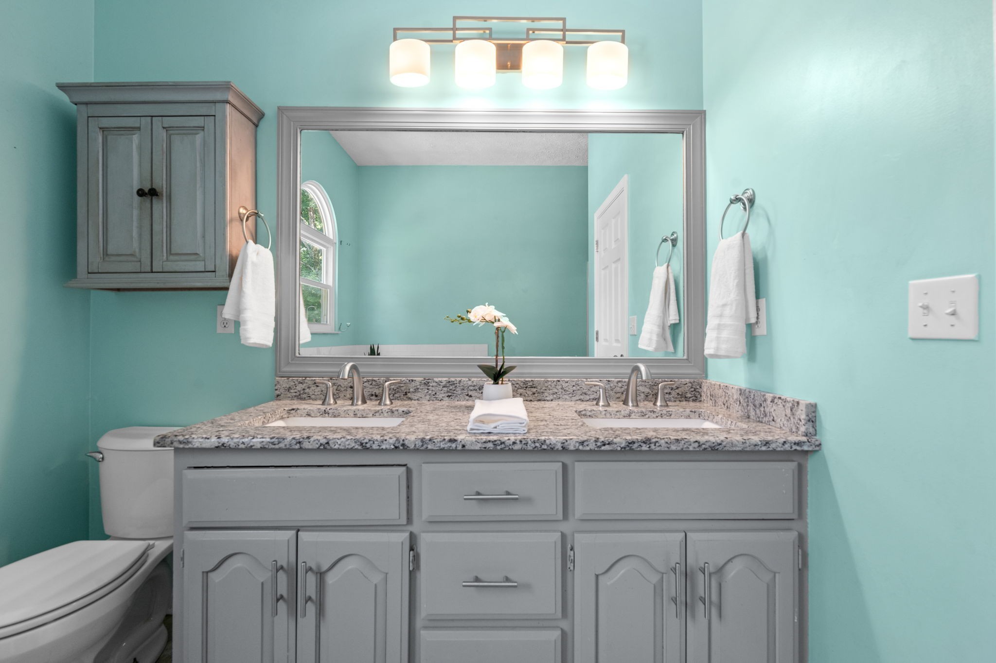 4178 Highway 49 Tennessee Ridge, TN 37178 - Photo 25 of 38 a bathroom with a granite countertop sink vanity mirror and toilet
