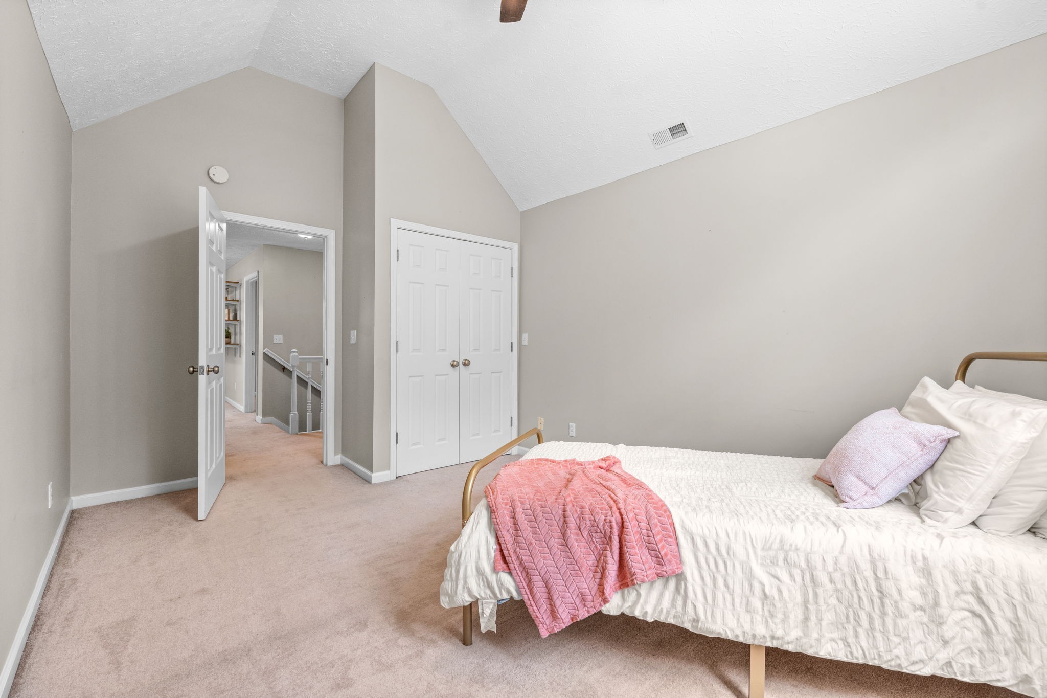 4178 Highway 49 Tennessee Ridge, TN 37178 - Photo 30 of 38 a bedroom with a bed and a walk in closet