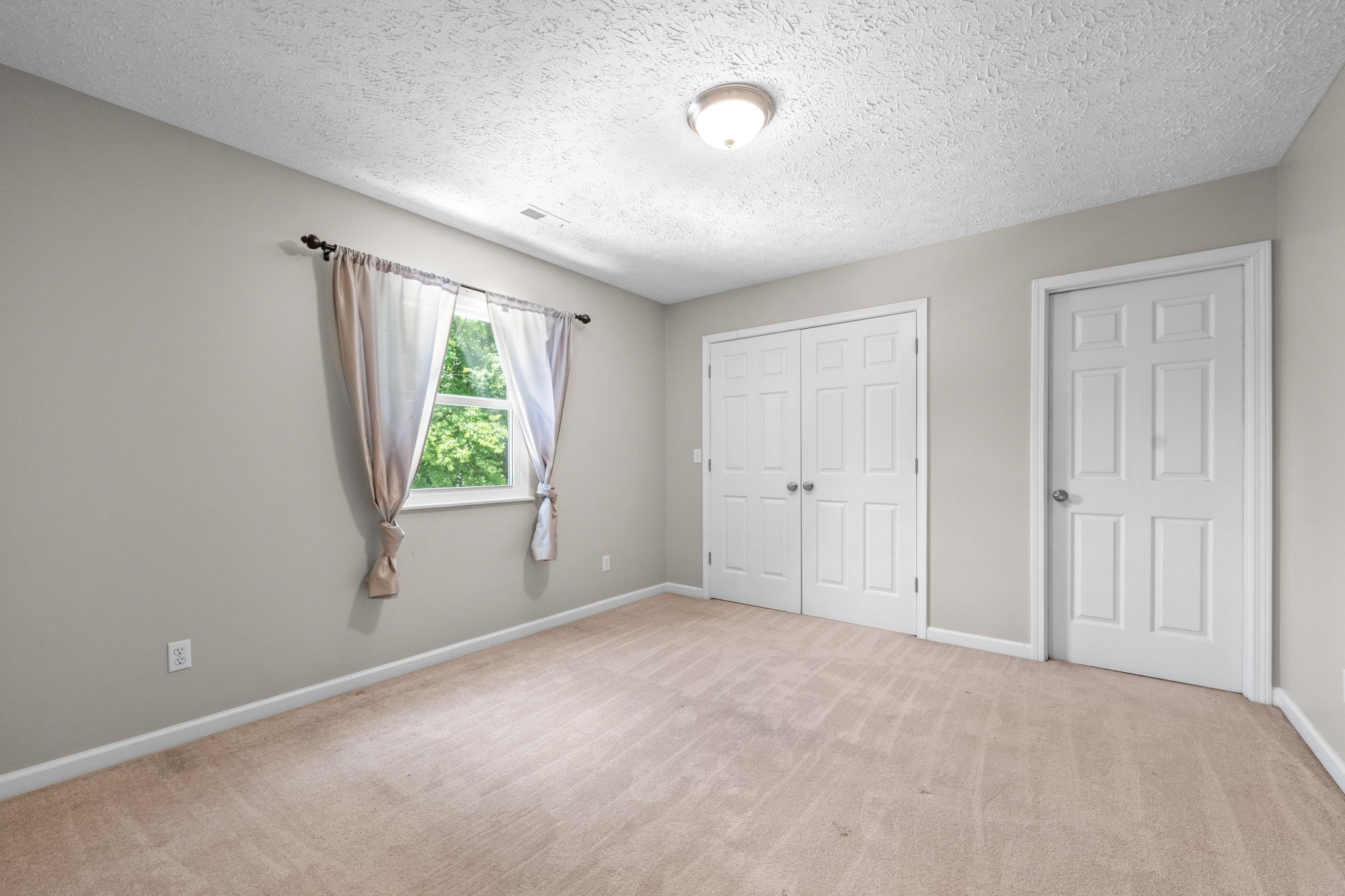 4178 Highway 49 Tennessee Ridge, TN 37178 - Photo 32 of 38 a view of an empty room with a window