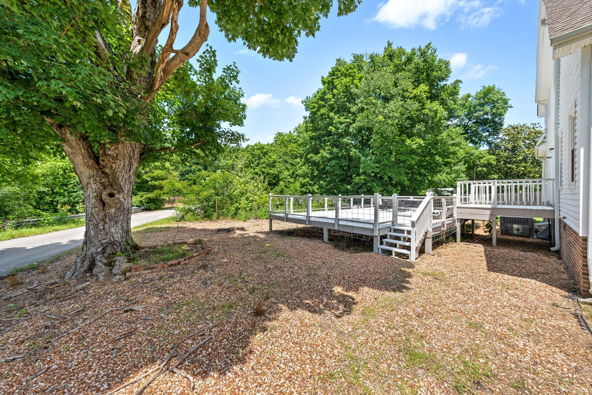 4178 Highway 49 Tennessee Ridge, TN 37178 - Photo 33 of 38 a view of a yard with furniture and a tree