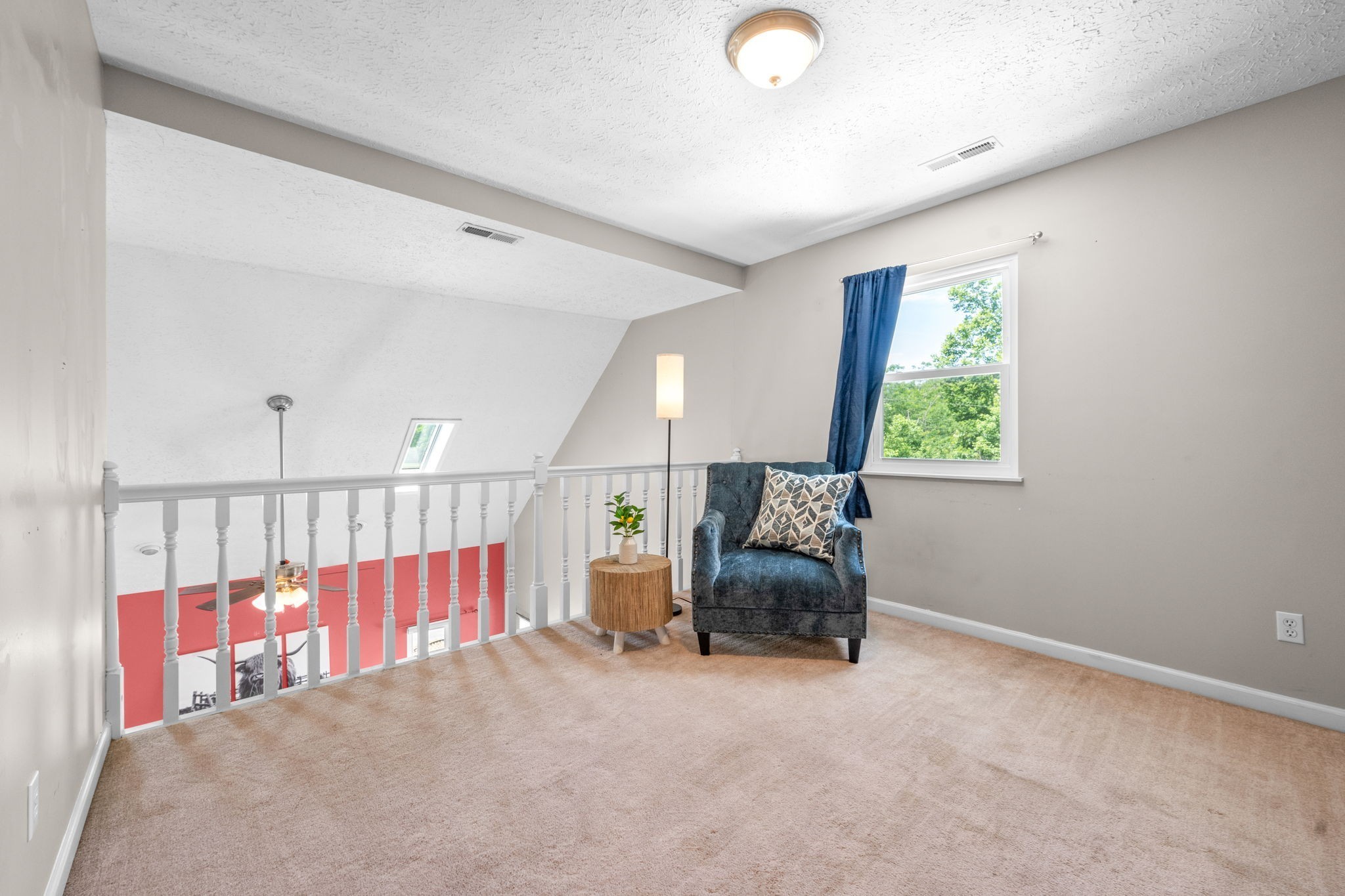 4178 Highway 49 Tennessee Ridge, TN 37178 - Photo 34 of 38 a bedroom with furniture and a lamp