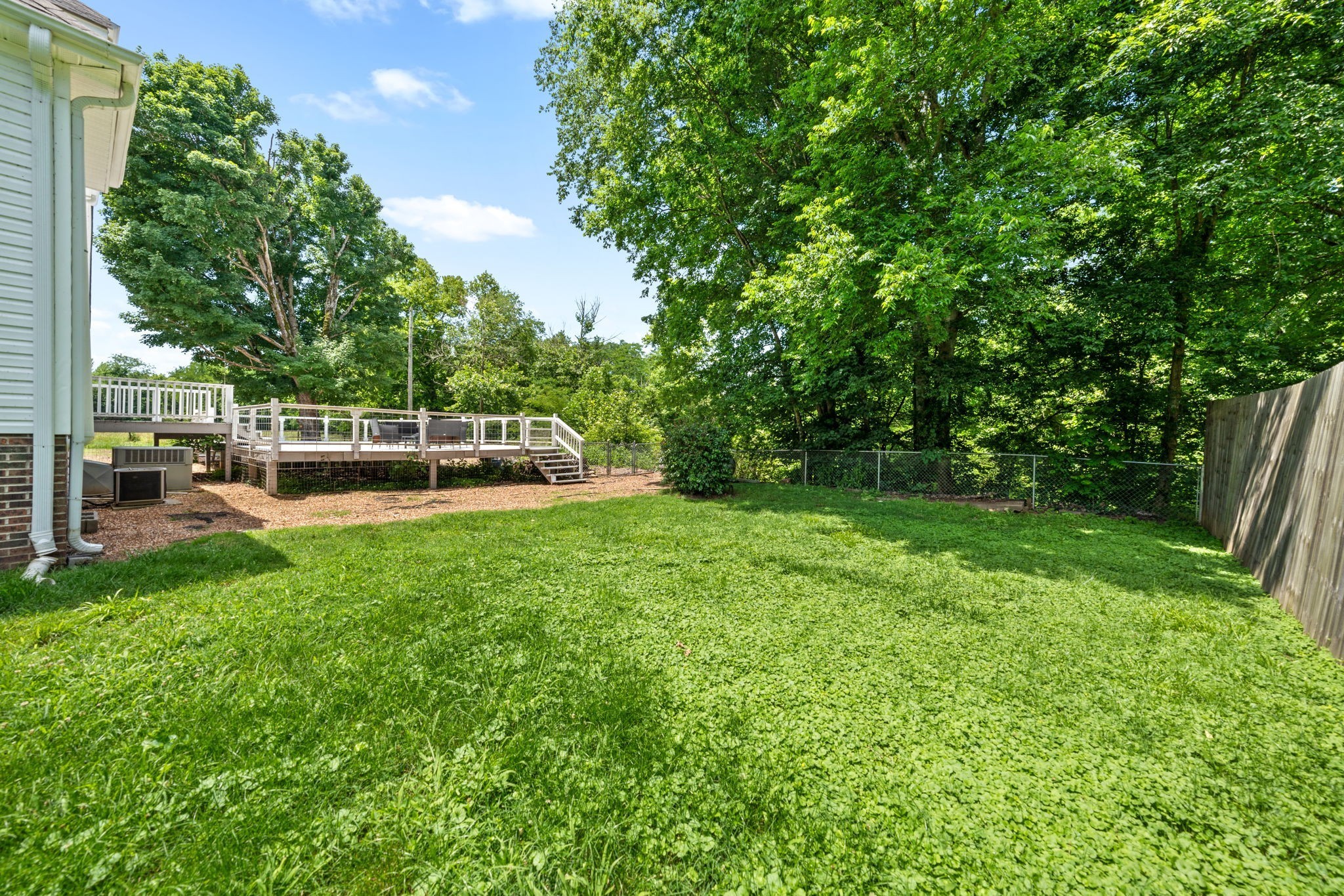 4178 Highway 49 Tennessee Ridge, TN 37178 - Photo 36 of 38 a view of a garden with a bench
