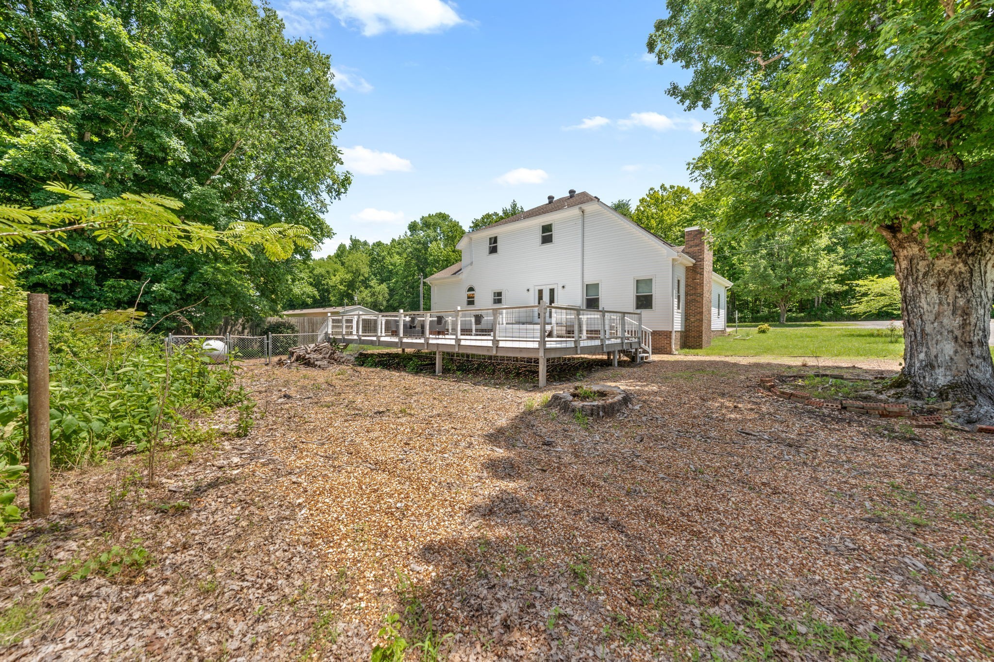 4178 Highway 49 Tennessee Ridge, TN 37178 - Photo 38 of 38 a view of a house with a yard