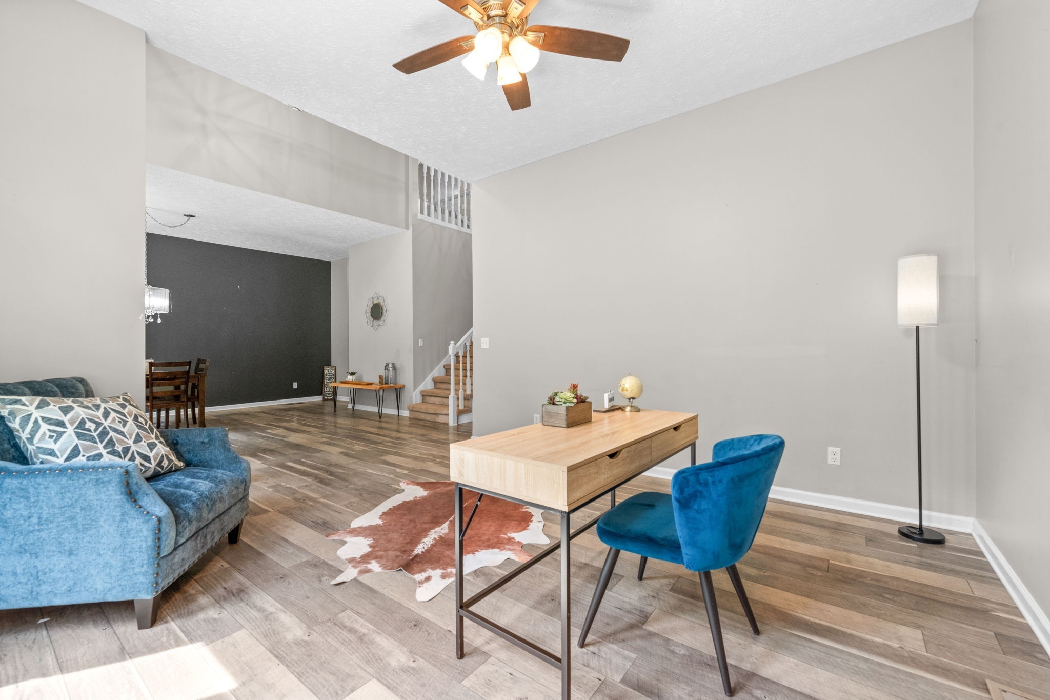 4178 Highway 49 Tennessee Ridge, TN 37178 - Photo 6 of 38 a view of a livingroom with furniture and wooden floor