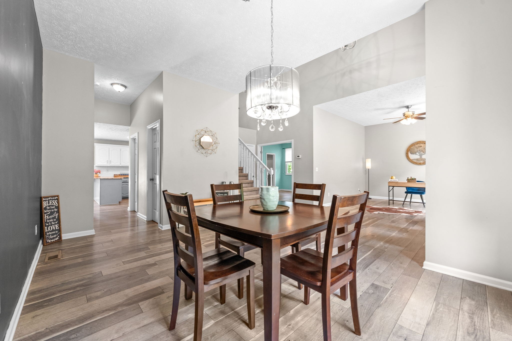 4178 Highway 49 Tennessee Ridge, TN 37178 - Photo 8 of 38 a view of a dining room with furniture and wooden floor