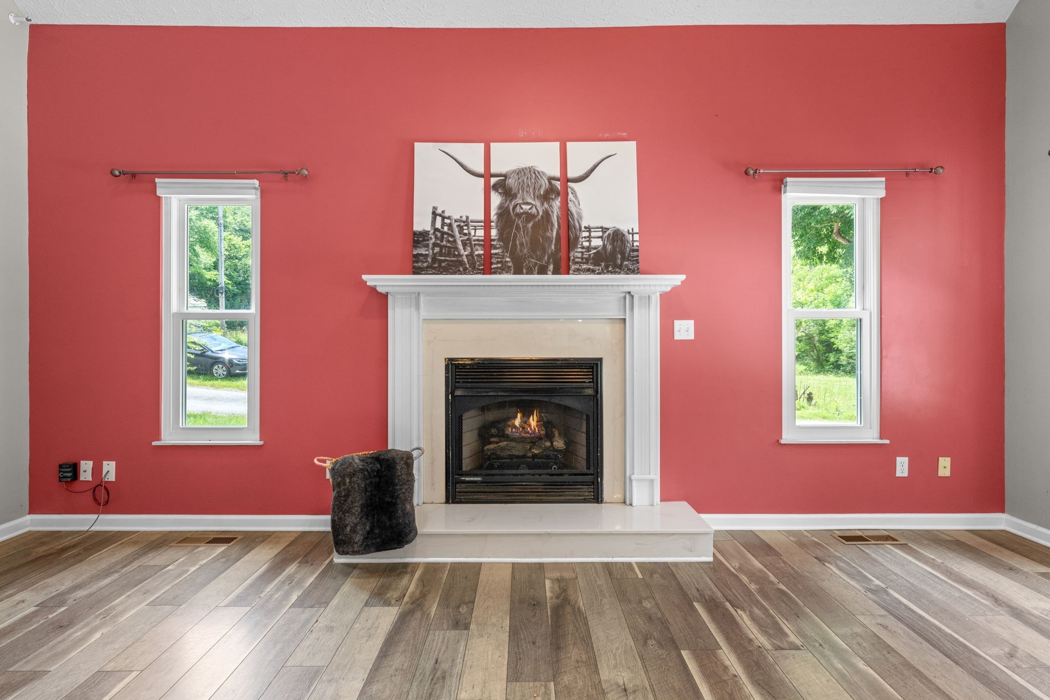 4178 Highway 49 Tennessee Ridge, TN 37178 - Photo 9 of 38 a view of an empty room with a fireplace and a window