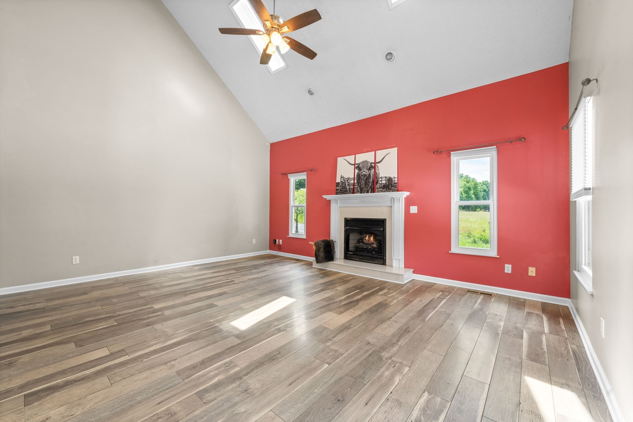4178 Highway 49 Tennessee Ridge, TN 37178 - Photo 10 of 38 a view of empty room with fireplace and fan