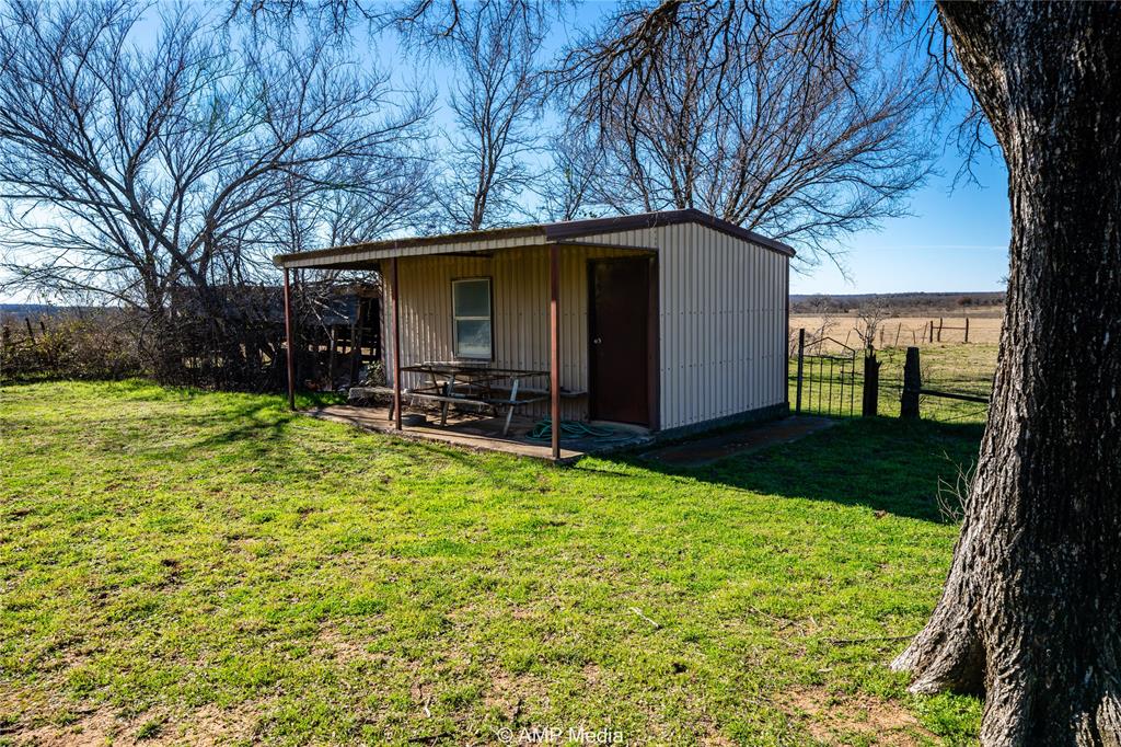 1992 Sand Flat Road Jacksboro, TX 76458 - Photo 17 of 36 View of outbuilding featuring a yard