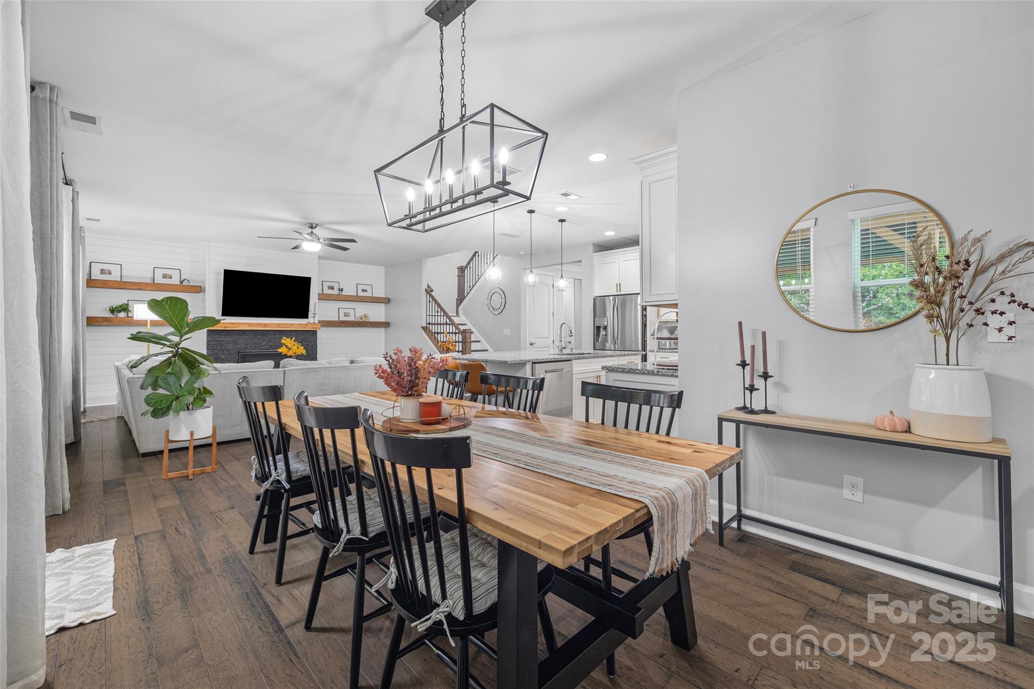 451 Sandbar Point Clover, SC 29710 - Photo 14 of 34 a view of a dining room with furniture and a chandelier