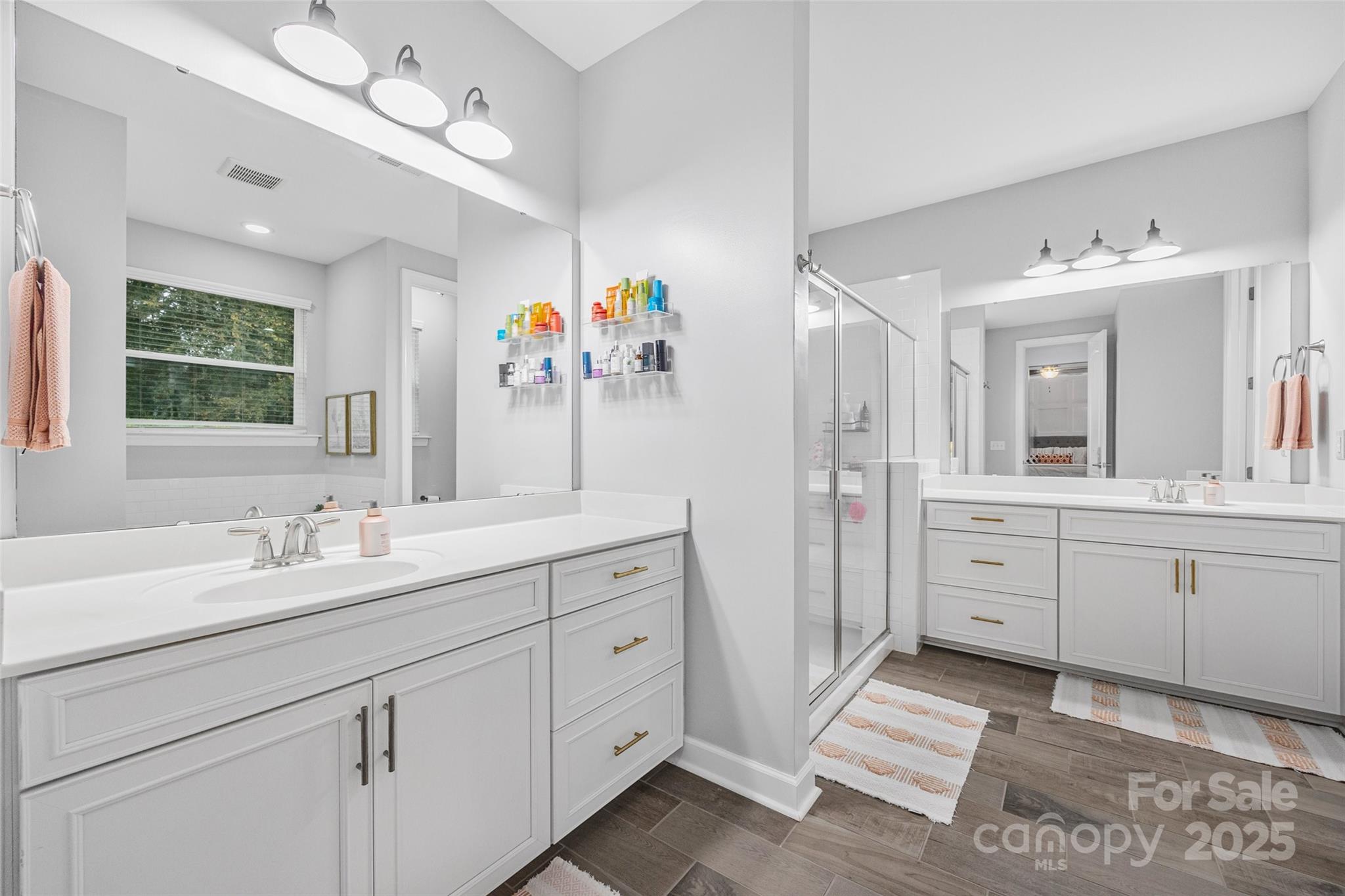 451 Sandbar Point Clover, SC 29710 - Photo 21 of 34 a bathroom with a double vanity sink mirror and bathtub