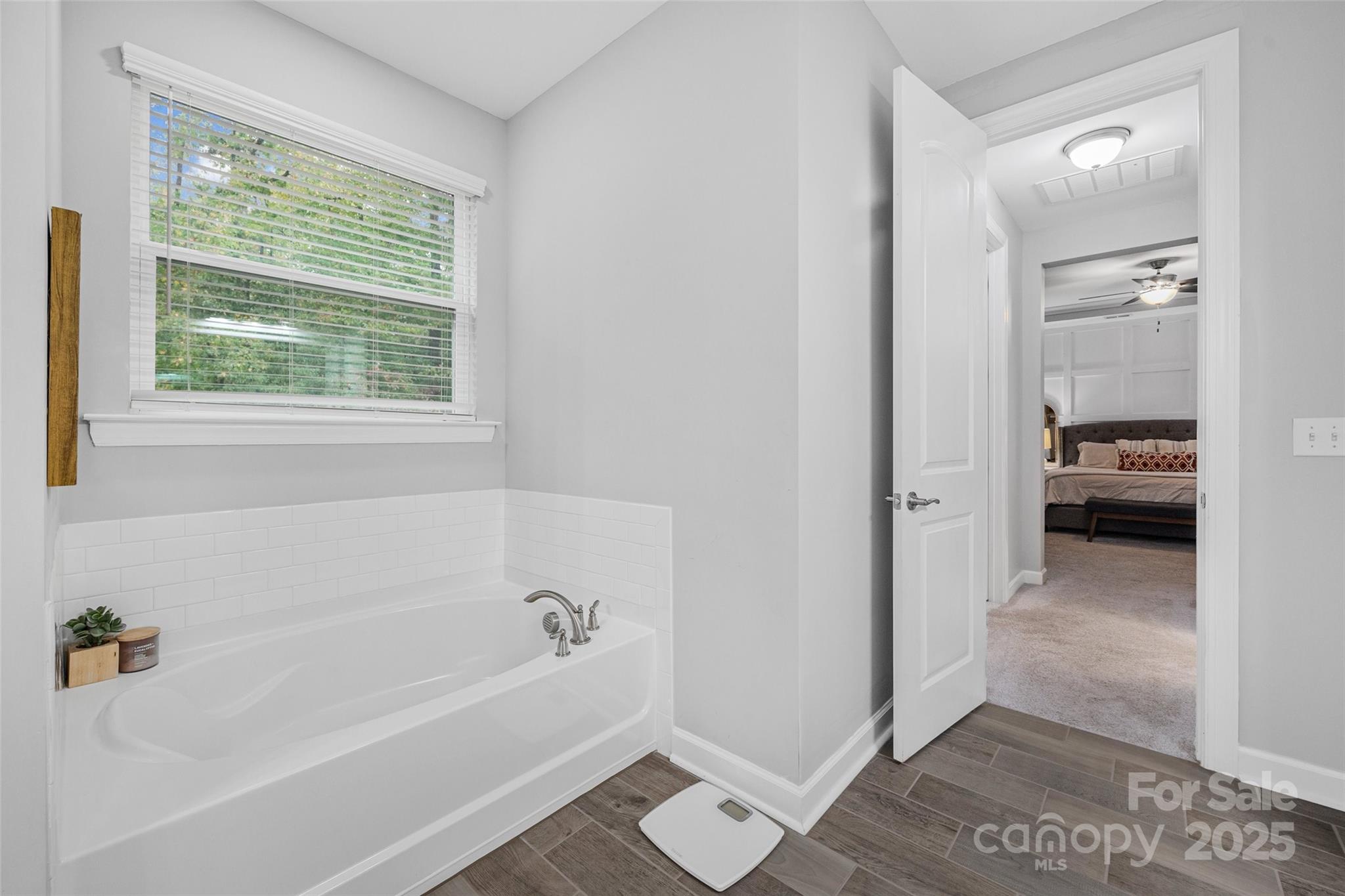 451 Sandbar Point Clover, SC 29710 - Photo 22 of 34 a bathroom with a tub shower and a sink
