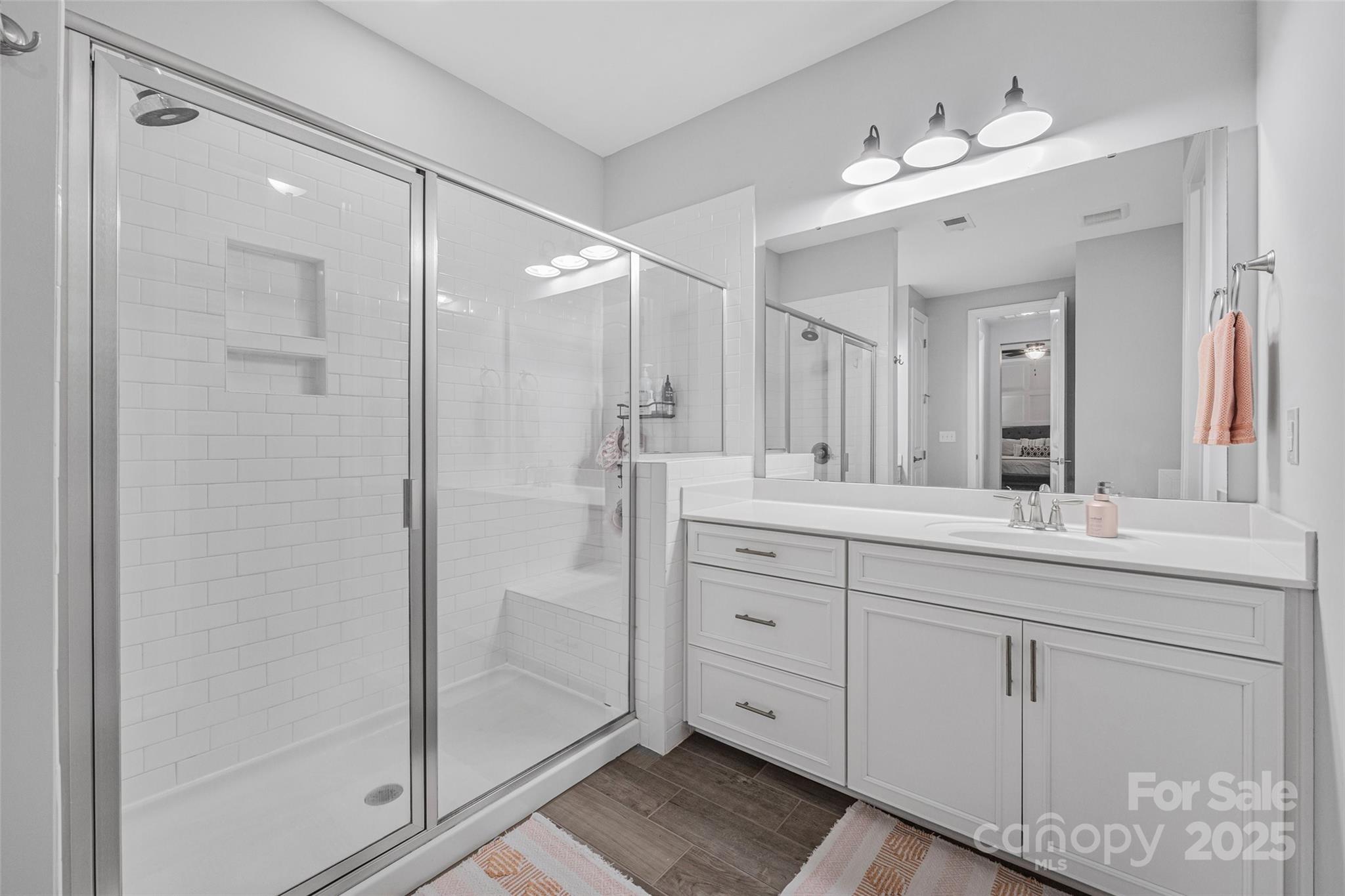 451 Sandbar Point Clover, SC 29710 - Photo 23 of 34 a spacious bathroom with a double vanity sink mirror and double