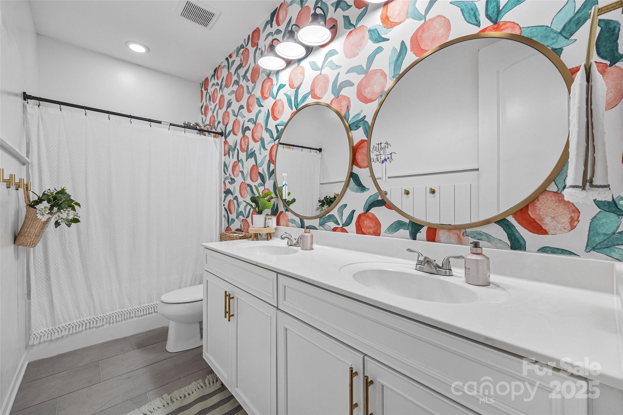 451 Sandbar Point Clover, SC 29710 - Photo 28 of 34 a bathroom with a sink mirror and toilet