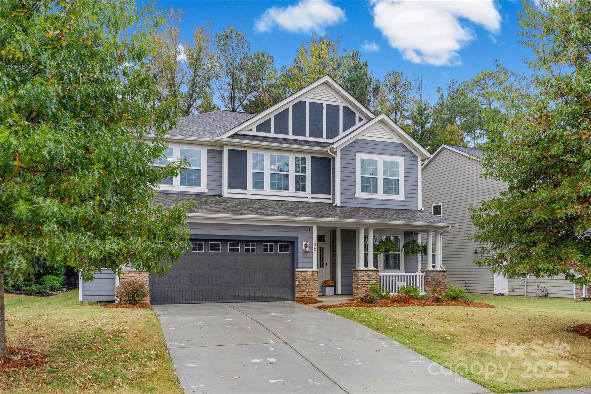 451 Sandbar Point Clover, SC 29710 - Photo 3 of 34 a front view of a house with a yard
